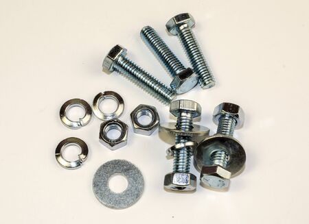 on a close-up shot of a small amount of automotive fasteners,の写真素材