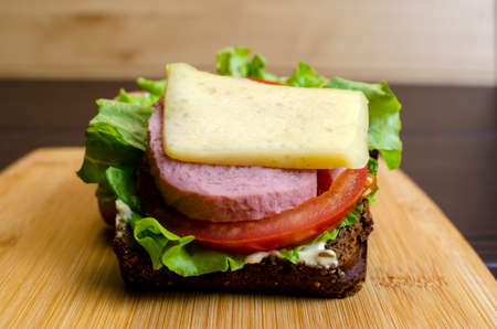 delicious sandwiches with vegetables, cheese and meatの写真素材