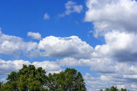 beautiful summer sky with bright cumulus clouds
