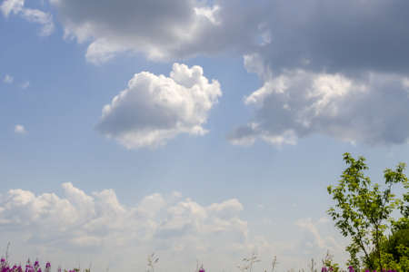 Blue sky and clouds background.