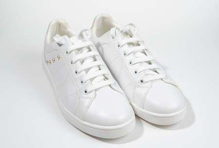 White sneakers isolated on a white background.