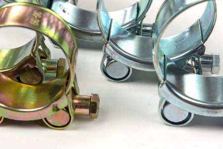 wide metal clamps for repairs in plumbing and manufacturing