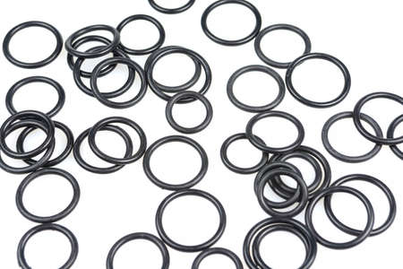 several sealing rings of different sizes in black close-up