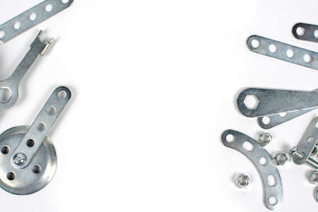 various details of children's metal constructor on a white background