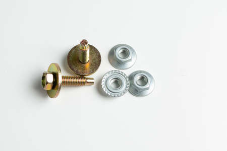 various metal fasteners on a white background