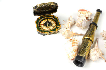 seashells and traveler items on white backgroundの写真素材