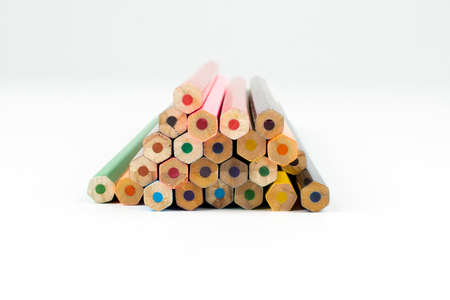 a stack of wooden colored pencils for drawingの写真素材