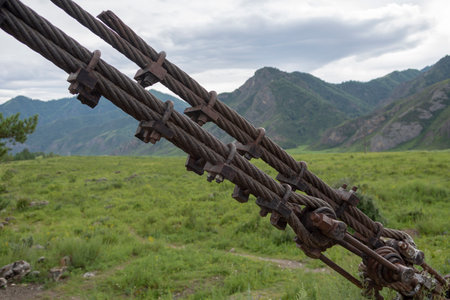 Structural elements of a suspended metal bridge over the Katun Riverの写真素材