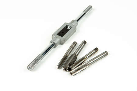 a set of professional tools for threading a hole in a repair