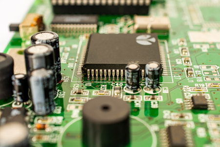 Close-up of a circuit board with microcircuits from an electrical appliance or computer. Concept of...