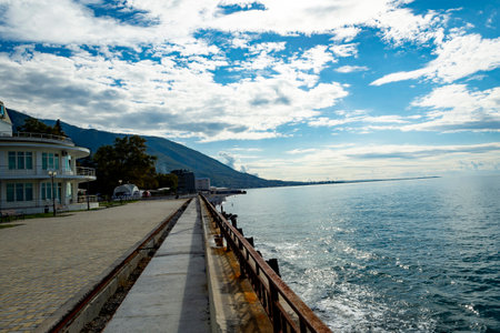 Landscape with a view of the embankment near the beach. Black Sea on a sunny summer day.の写真素材