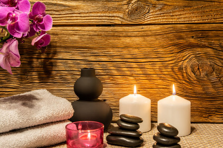 Spa, zen basalt stones, towels, candles in the massage room.の写真素材