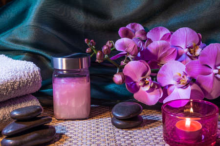 Spa, zen basalt stones, towels, candles in the massage room.の写真素材