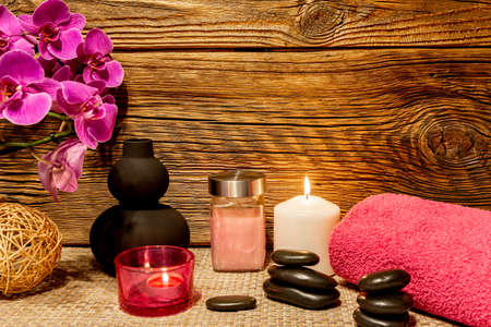 Spa, zen basalt stones, towels, candles in the massage room.の写真素材