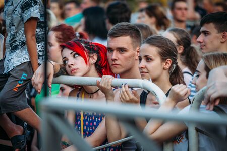 Yessentuki, Stavropol Territory / Russia - August 12, 2017: crowd of fans at the concert outdoors behind the fenceのeditorial素材