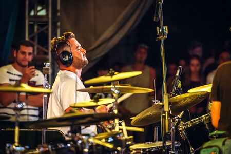 Yessentuki, Stavropol Territory / Russia - August 12, 2017:drumfest drummers festival. musician on stage playing drumsticks on drums Outdoorsのeditorial素材