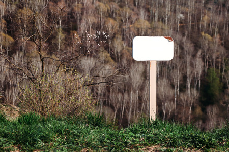 mock up of the blank white signs in Park on mountainsideの写真素材