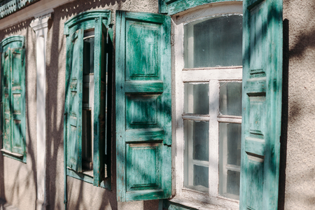 vintage old wooden window with open shuttersの写真素材