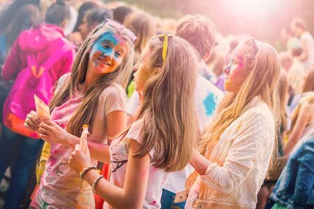 Kemerovo, Russia, June 24, 2018: Young girls painted in colored powder at a holi festival of colorsのeditorial素材
