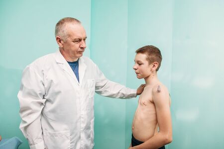 healing bloodletting hijama or phlebotomy hajam master conducts cupping therapy on a young man