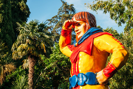 Sochi, June 5, 2018, art object made of fiberglass "Giant" (Gulliver) Riviera Park, close-up in green leaves.のeditorial素材