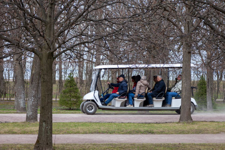 Saint Petersburg, Russia, 22.04.2019, tourists go to see sights on electric car tourist.のeditorial素材