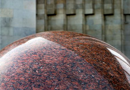 marble sphere against wallの写真素材