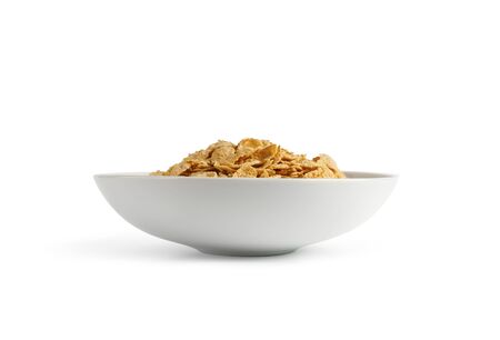 Corn flakes isolated in a plate on white background.の写真素材