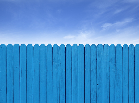 Fence wooden parallel bars, painted blue. Isolated on a white background.の写真素材