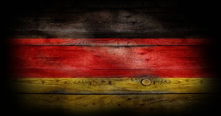 Flag of Germany painted on grungy wood plankの写真素材