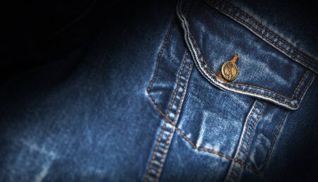 CHISINAU, MOLDOVA - December 25, 2017: Jeans jacket Wrangler blue color. Pocket closeup. The Wrangler brand is owned by VF Corporation of Greensboro, North Carolina USA. Blurred conceptのeditorial素材