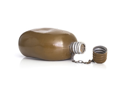 Old Military canteen. Army water canteen isolated on a white background. military water bottleの写真素材