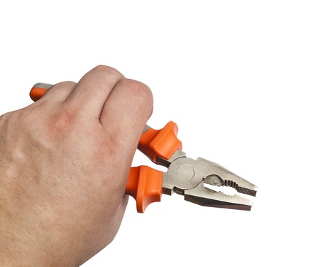 Hand holding a orange pliers isolated on white background.