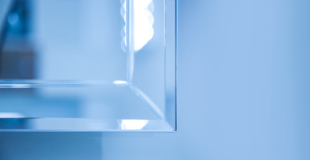 Glass, mirror reflection shapes and shadows. Close-up details.の写真素材