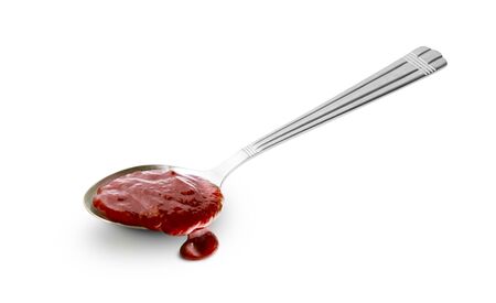 Red barbecue sauce in spoon isolated on white background with clipping pathの写真素材
