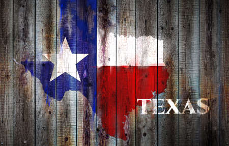 Texas flag and map on old wood plank backgroundの写真素材