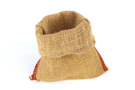 Empty burlap bag or sack to be filled in isolated on white backgroundの写真素材