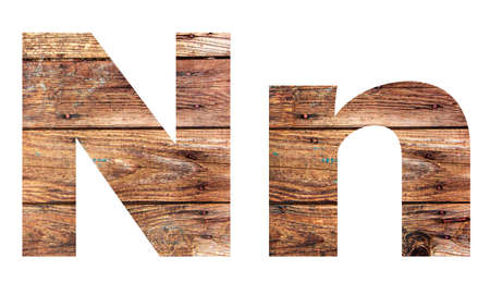 Wooden letters. Letter N. English alphabet isolated on white background.の写真素材