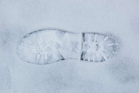 Hiking shoe track on snow