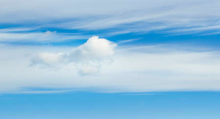 blue sky with white cloudsの写真素材