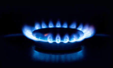 natural gas flame. Burning gas, gas stove burner, hob in the kitchenの写真素材