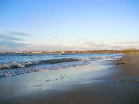 Sunny day, beach, autumn, sea walk in the fresh air.の写真素材