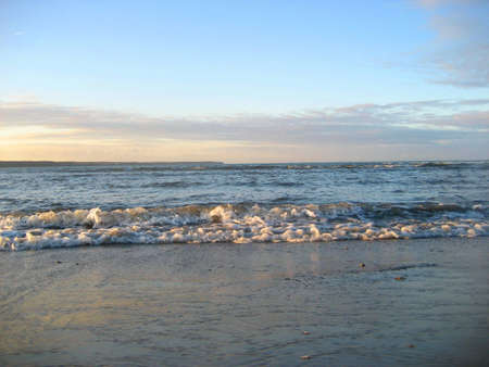 Sunny day, beach, autumn, sea walk in the fresh air.の写真素材