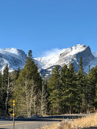 Beautiful Rocky Mountains on a Snowy Day in Denver Coloradoの写真素材