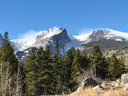 Beautiful Rocky Mountains on a Snowy Day in Denver Coloradoの写真素材
