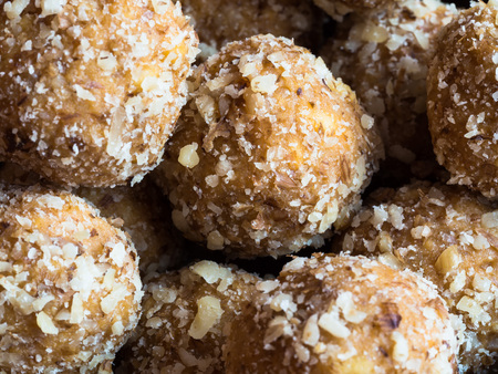 Detail of tasty homemade walnut balls, traditional Christmas sweets