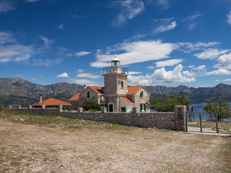 Beautiful lighthouse made of stone on Hvar island, Sucuraj, Croatiaの写真素材