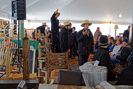 PENRYN PENNSYLVANIA - MARCH 18, 2017: Amish volunteers sell furniture and crafts at the annual  auction "Amish Mud Sale" to benefit Penryn Fire Co.#1 and Limerock Parochial School.のeditorial素材
