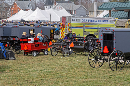 GAP PENNSYLVANIA - MARCH 25, 2017: Annual "Amish Mud Sale" to benefit Gap Fire Company. Multiple auctioneers sell quilts, tools, crafts, farm machinery and antiques.のeditorial素材