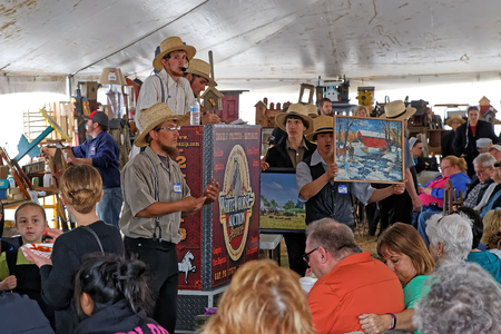 GAP PENNSYLVANIA - MARCH 25, 2017: Amish volunteers sell art and craft items under a tent at the annual "Amish Mud Sale" to benefit Gap Fire Company.のeditorial素材